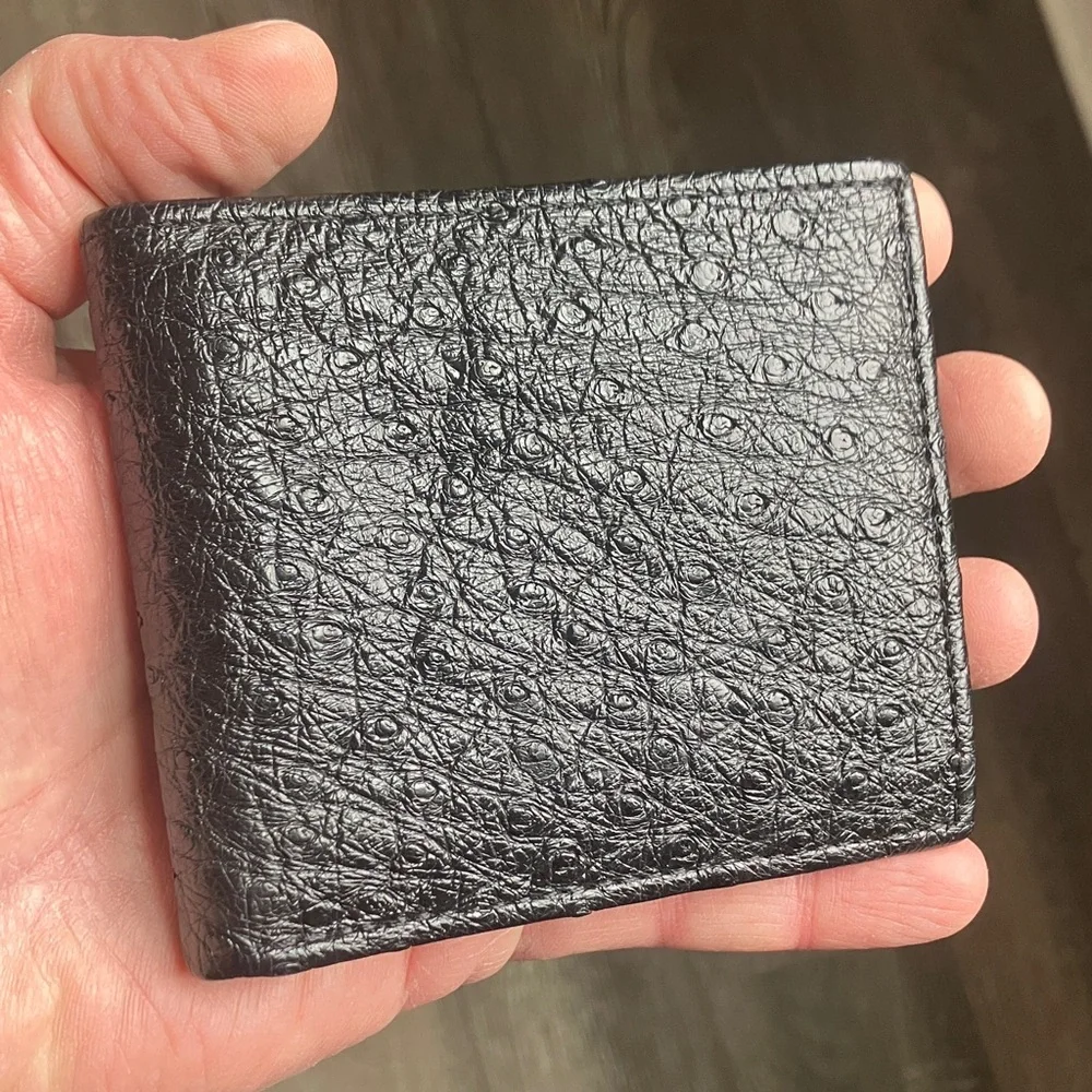 black bifold wallet made from genuine ostrich leather.
